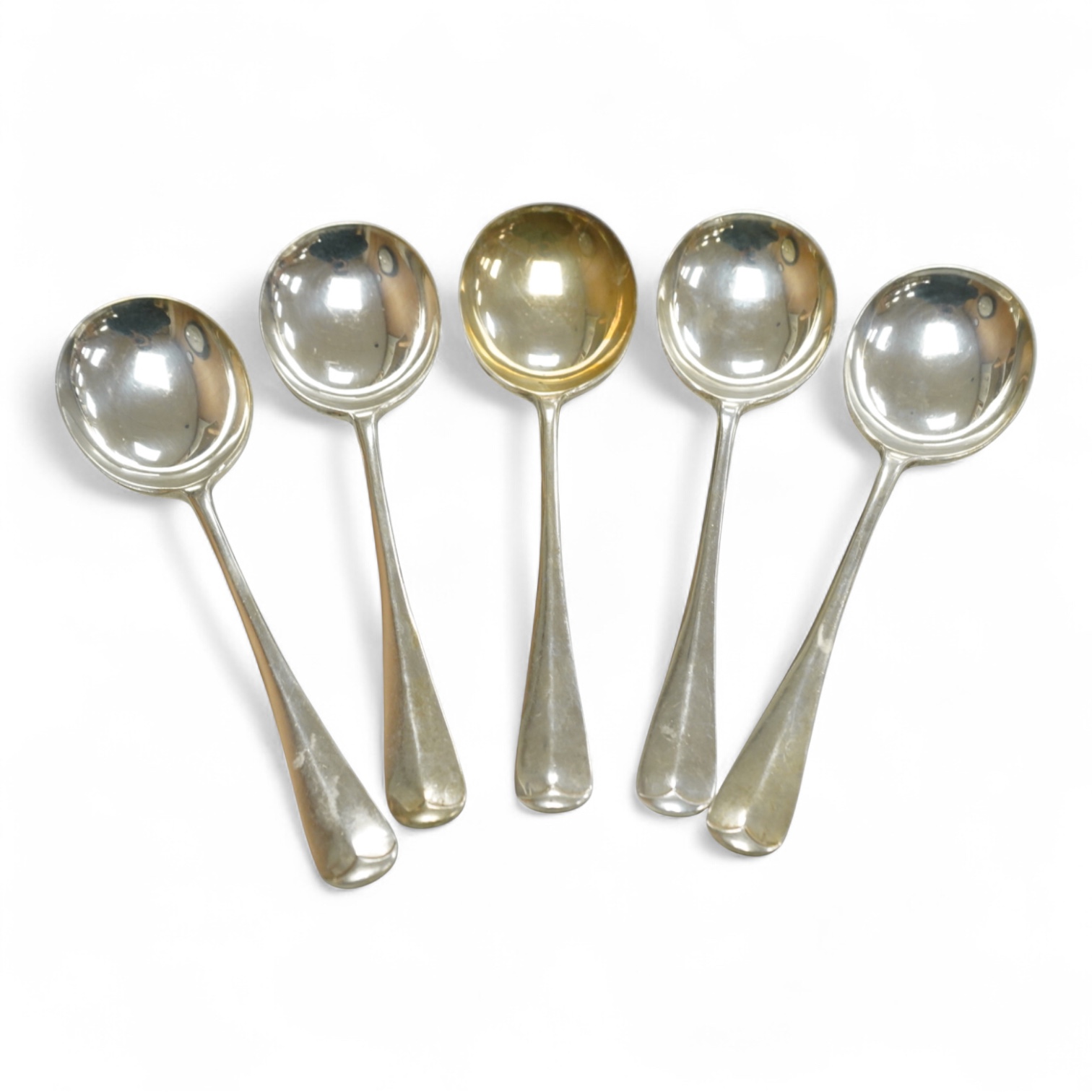 A set of five George V silver Hanoverian rat tail patter soup spoons, Walker & Hall, Sheffield, 1935, 17.9cm, 10.6oz.